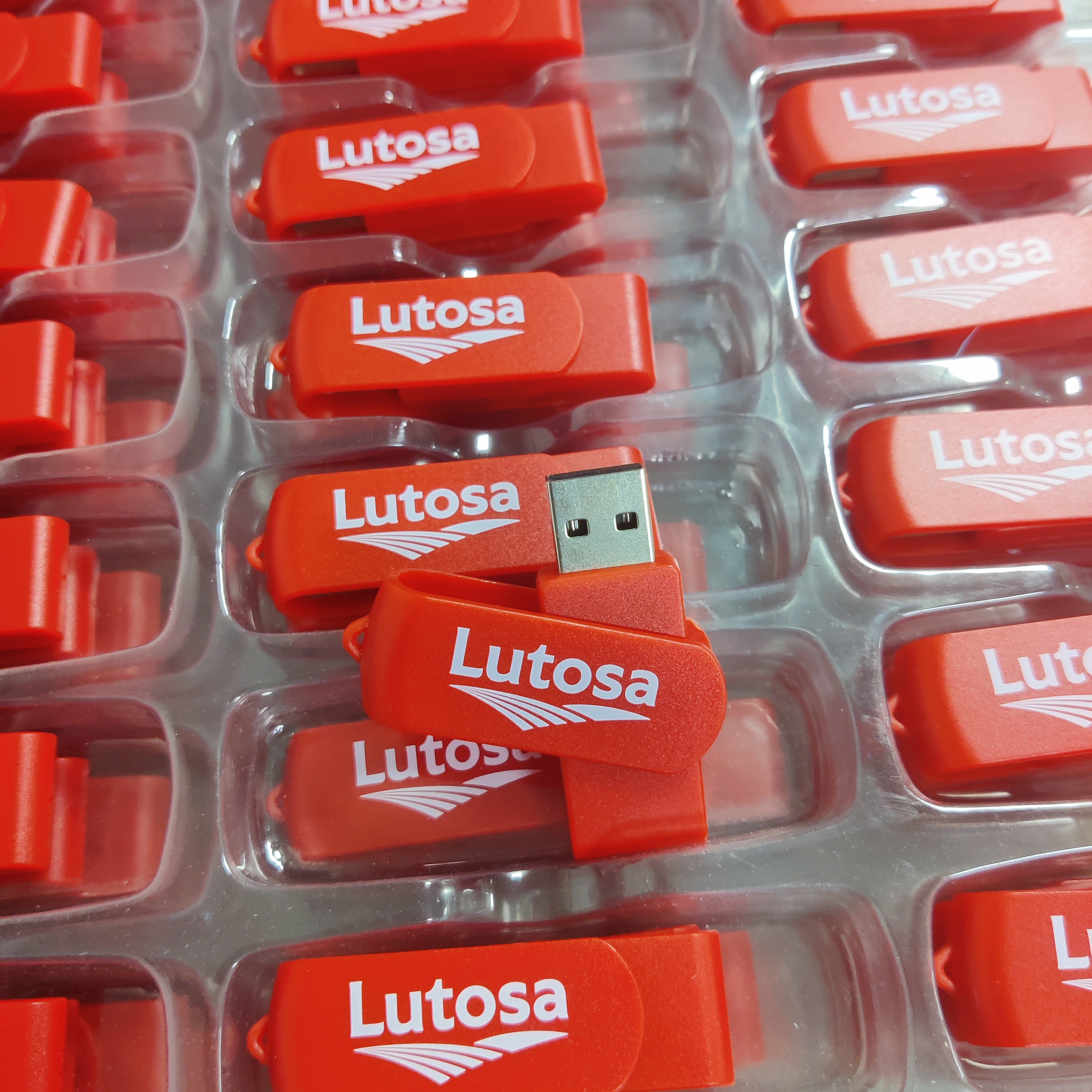 Red Plastic Swivel Memory Sticks  as promotional corporate gift